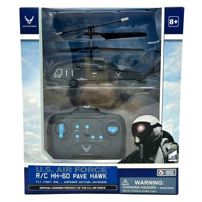 Boxed U.S. Air Force R/C HH-60 Pave Hawk helicopter toy with remote, pilot figure, and warnings.